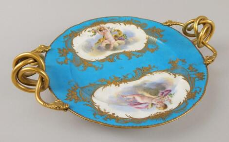 A late 19thC Sevres style two handled centrepiece