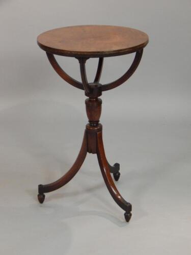 An early 19thC mahogany globe stand