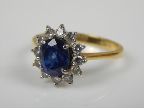 A sapphire and diamond floral cluster