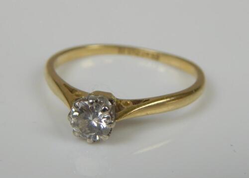 A diamond solitaire ring