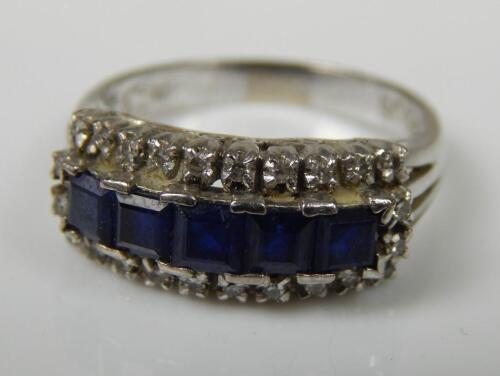 A sapphire and diamond dress ring