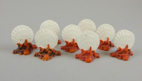 A matched set of eight Victorian pottery menu holders