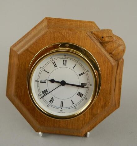 A brass cased mantel clock