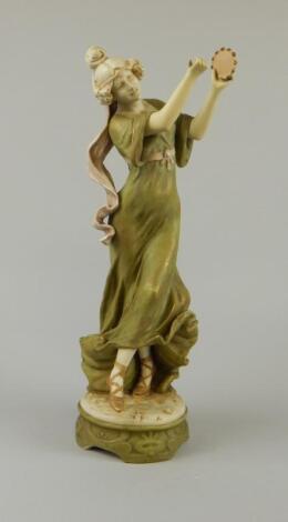 An early 20thC Royal Dux figure of a lady