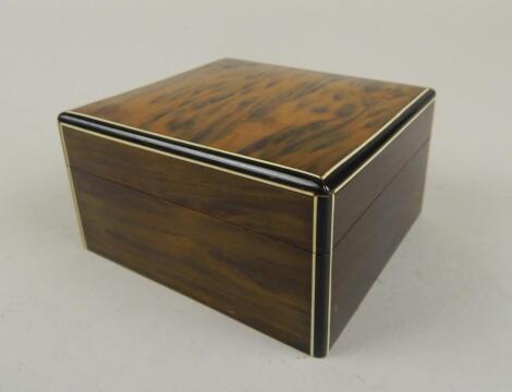 An early 20thC tiger wood finish and cedar lined card box