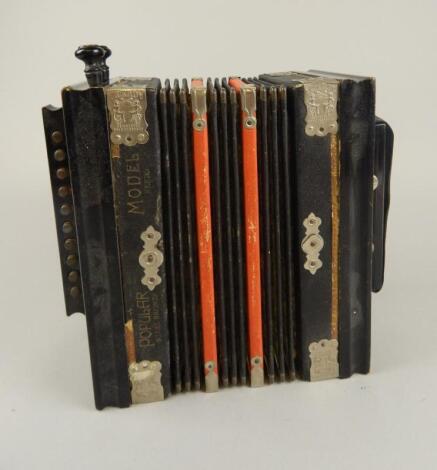 An early 20thC Popular squeeze box accordion