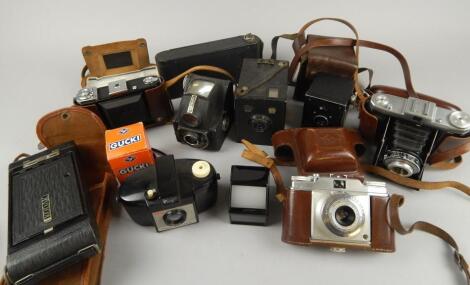 Various cased cameras