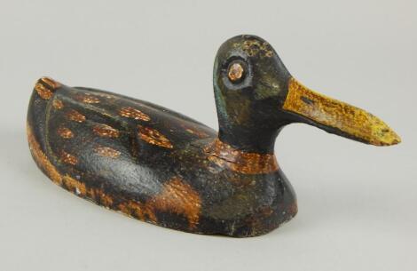 An early 20thC painted Folk Art decoy duck