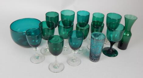 A collection of Victorian and later green and blue tinted glassware