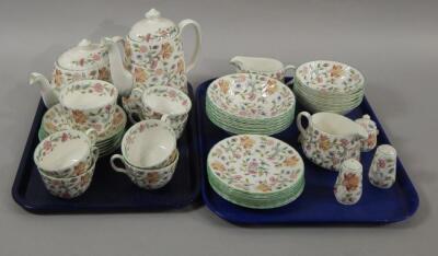 A large quantity of Minton Haddon Hall pattern tea ware