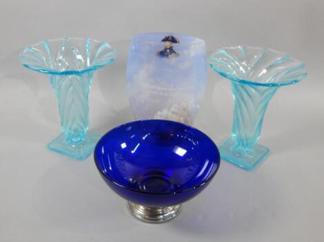 A pair of Art Deco style turquoise coloured glass vases