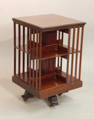 An Edwardian mahogany revolving bookcase