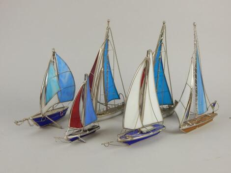 Various silvered metal and stained glass models of yachts