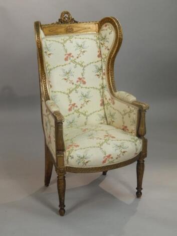 A late 19thC / early 20thC French gilt gesso wingback chair