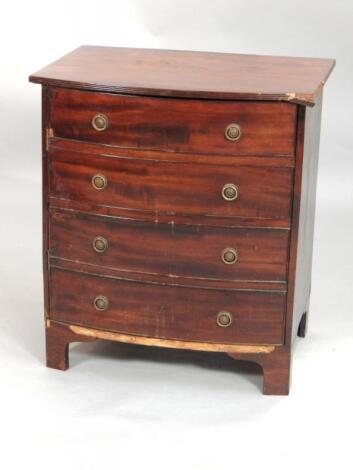 An early 19thC mahogany bow fronted side cabinet