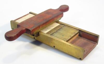 A 19thC mahogany brass and marble pill maker