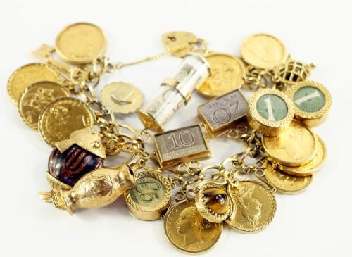 A 9ct gold and gold curb link charm bracelet with nine gold sovereigns and two gold half sovereigns