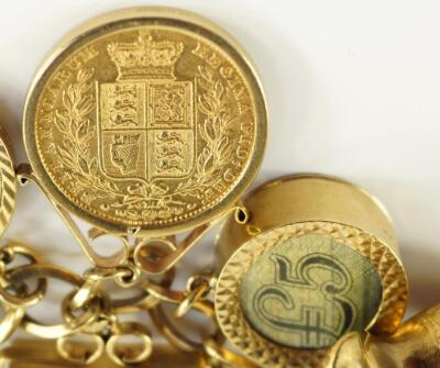 A 9ct gold and gold curb link charm bracelet with nine gold sovereigns and two gold half sovereigns - 3