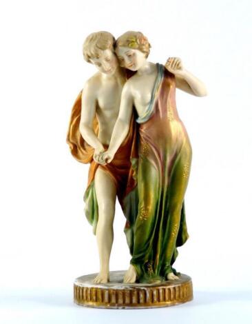 A Royal Vienna blush porcelain figure group of a pair of classical lovers