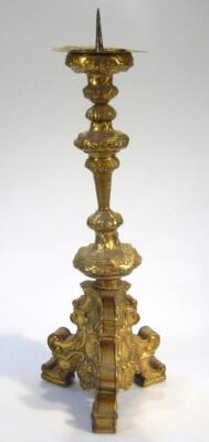 A gilt metal church altar stick