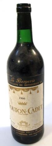 A bottle of 1966 Philippe De Rothschild Mouton-Cadet red wine