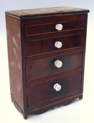 An early 19thC mahogany miniature tradesman piece chest