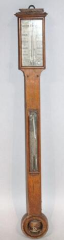 A late 19thC oak cased stick barometer