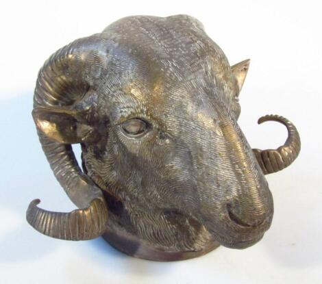 A 20thC hollow brass rams head