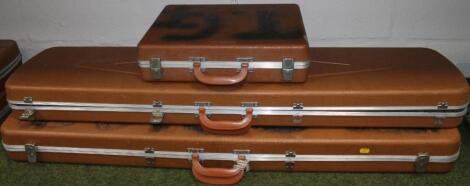 Two various pressed plastic travelling gun cases