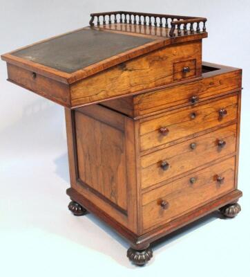 An early 19thC rosewood Davenport - 5