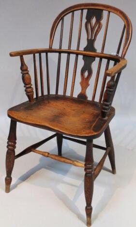 A mid-19thC ash and elm low back Windsor chair