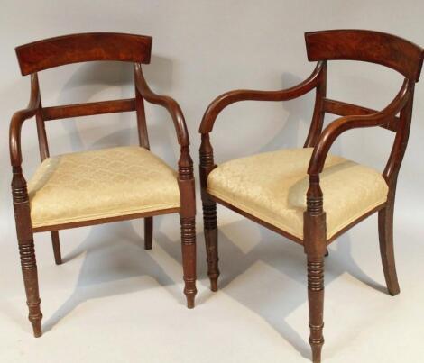 A pair of Victorian mahogany carver chairs