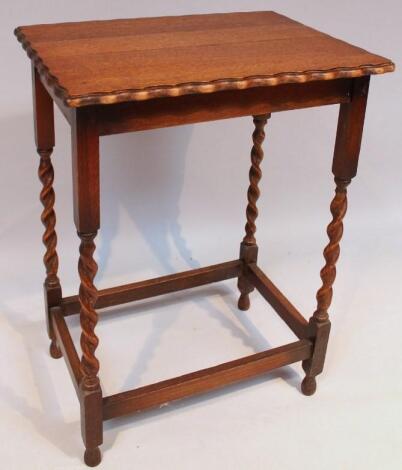 A 1920's oak barleytwist occasional table