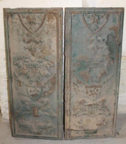 A pair of cast iron rectangular panels