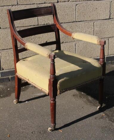 An early 19thC mahogany framed deep seated carver chair