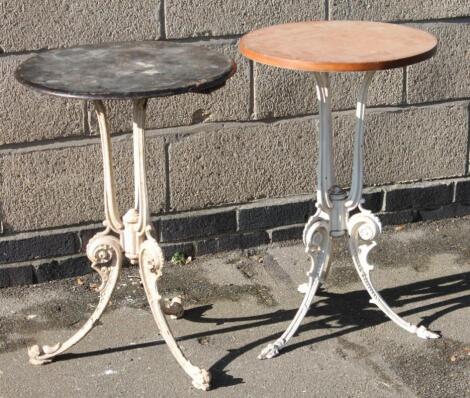 A near matching pair of late 19thC cast iron pub table bases