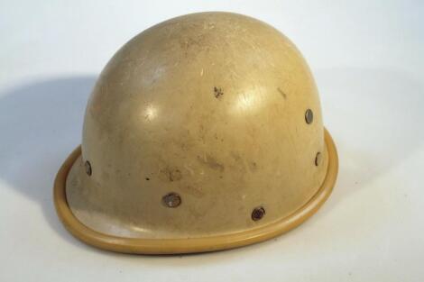 A 20thC shaped war helmet