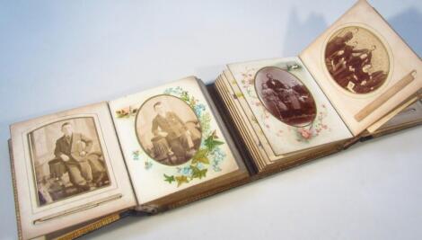 A late Victorian leather bound double photograph album