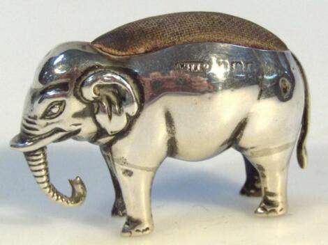 An Edwardian silver elephant pin cushion