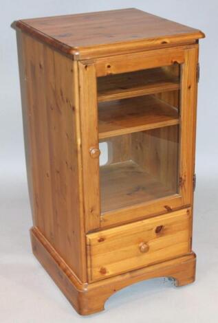 A stripped and lightly polished pine Ducal pine pedestal cabinet