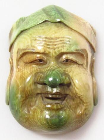 A Chinese heavily polished Buddha head