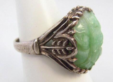 A 20thC green jade costume ring