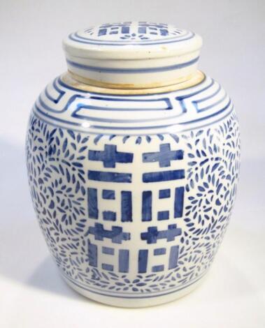 A Chinese earthenware Ming style blue and white jar and cover