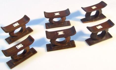 Six various 20thC Chinese hardwood miniature serviette rings