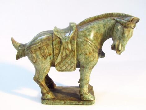 A mid 20thC Chinese Tang style green jade figure of a standing horse