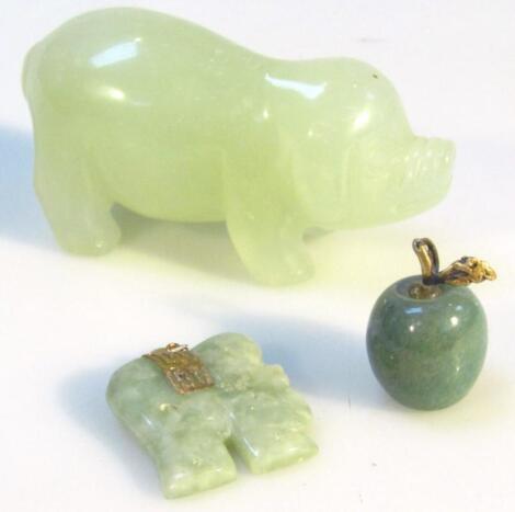 A polished jade finish and jadeite carvings