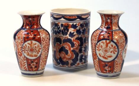 A pair of Japanese Imari pottery vases