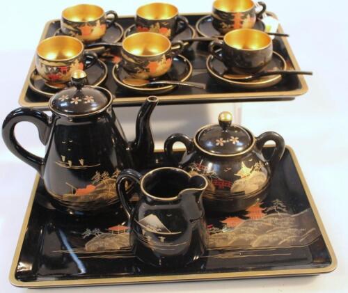 A 20thC oriental black lacquered part service