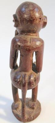 A heavily carved African tribal hardwood figure - 2