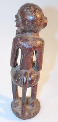 A heavily carved African tribal hardwood figure - 5